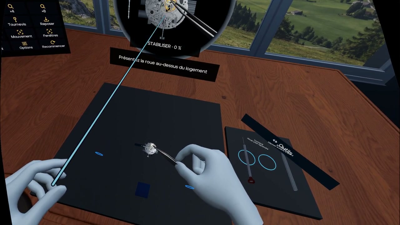 Interaction avec les mains dans le prototype ETA : roue tenue à la brucelle et placement guidé. Interface française.